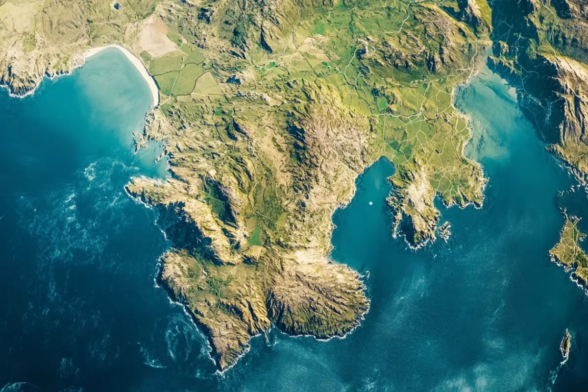 UK and EU Reunite Carbon Markets in Major Post-Brexit Deal_Aerial satellite capture of UK and EU regions, highlighting terrain and green cover_visual 1